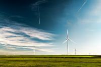 Image: windmills in field. Topic:10 Ways You Can Fight Climate Change